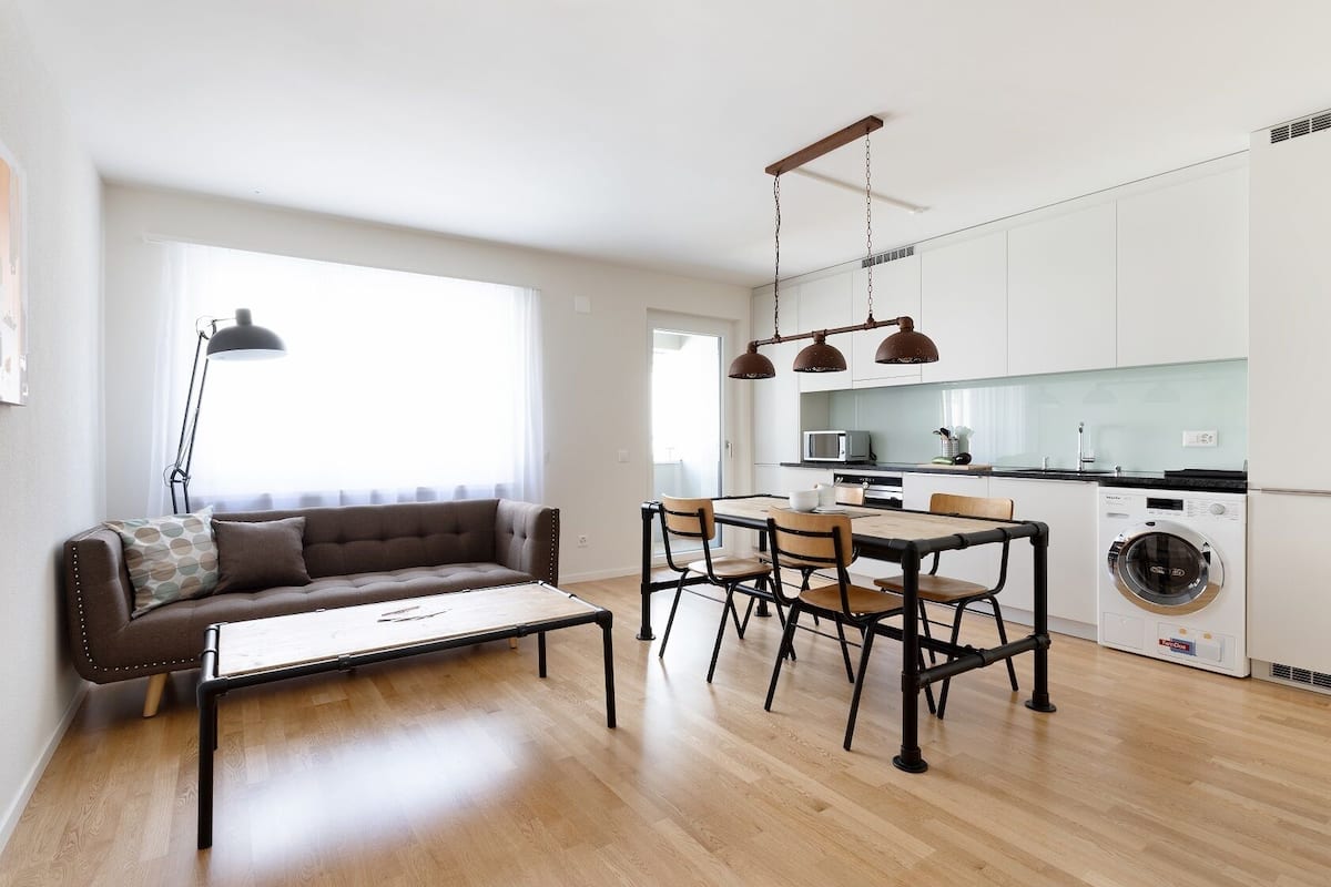 City Apartment | Living area | 50-cm flat-screen TV with digital channels