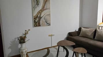 Deluxe Studio | Living area | 32-inch LCD TV with cable channels