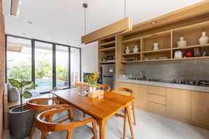 Deluxe Villa | Private kitchenette | Full-size fridge, microwave, stovetop, toaster