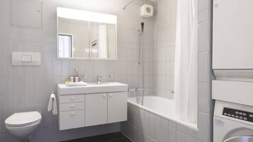 City Apartment | Bathroom | Rainfall showerhead, hair dryer, towels, soap