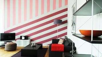 City Apartment | Living area | 40-cm TV with digital channels
