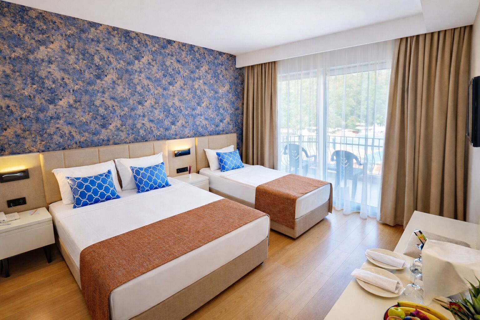 Standard Triple Room, Balcony | Minibar, in-room safe, laptop workspace, blackout curtains