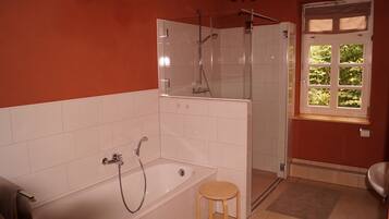 Shower, hair dryer, towels, soap