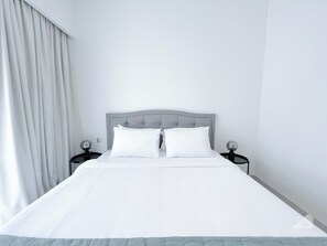 Apartamento (1 Bedroom) | 1 quarto, ferros/tábuas de passar roupa, roupa de cama