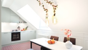 Executive Penthouse, 1 Bedroom, City View | Living area | 60-inch flat-screen TV with digital channels, offices - Nest -  Müllerstrasse (Zürich)