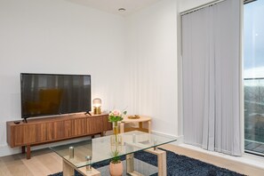 Appartement, plusieurs lits | Coin séjour