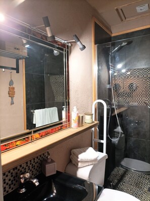 Shower, hair dryer, towels, soap