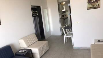Apartment, 1 Bedroom, Smoking, Balcony | Living area