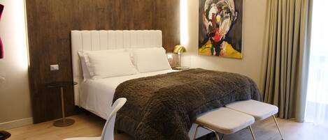 Junior suite | 1 slaapkamer, luxe beddengoed, donsdekens, Select Comfort-bedden
