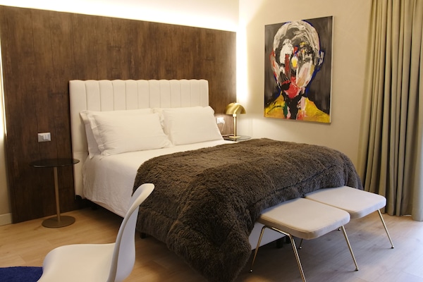 Junior Suite Deluxe | 1 kamar tidur, seprai premium, dan selimut bulu angsa