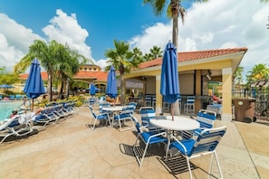 Outdoor dining - Sunnyside Villa 6 Bedroom Home by RedAwning (Kissimmee)