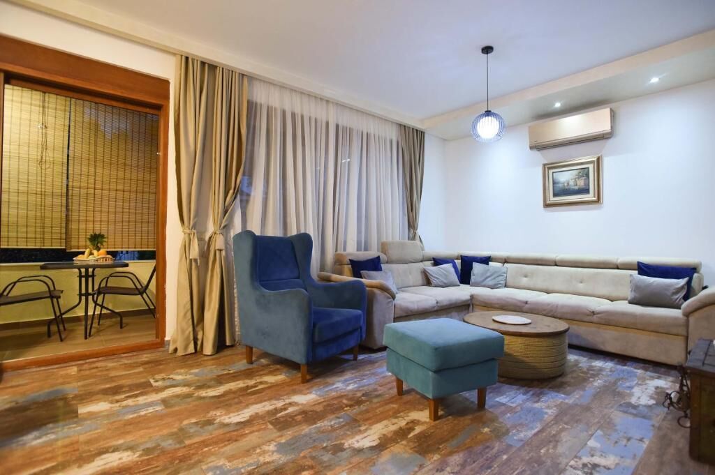 Apartamento luxo | Área de estar | TV LCD 32 polegadas com canais a cabo