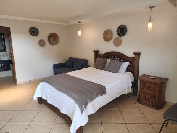 1 habitación, tabla de planchar con plancha, wifi y ropa de cama 