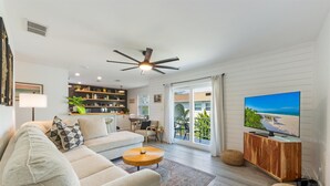 Smart TV, books - Bayou Beach Vibes: *Canal view *Central location *Updated condo (Anna Maria)