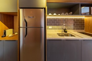 Full-sized fridge, microwave, stovetop, espresso maker