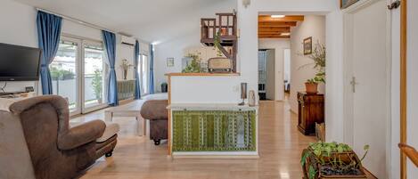 Apartment | Living area | 47-inch flat-screen TV with cable channels