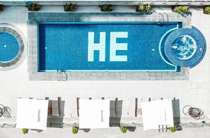 Outdoor pool, sun loungers - HE Hotel Apartments (Dubai)