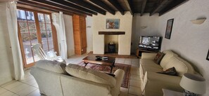 TV, fireplace - Two gites located side by side in a medieval village with heated pool sleeps 7/8 (Bazoges-en-Pareds)