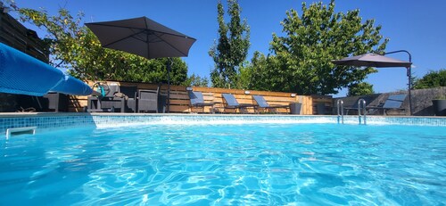 Two gites located side by side in a medieval village with heated pool sleeps 7/8