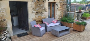 Terrace/patio - Two gites located side by side in a medieval village with heated pool sleeps 7/8 (Bazoges-en-Pareds)