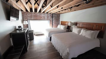 Hypo-allergenic bedding, pillow-top beds, in-room safe, desk