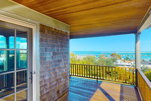 Charming & historical waterfront retreat with patio, W/D, & amazing balcony view