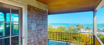 Charming & historical waterfront retreat with patio, W/D, & amazing balcony view