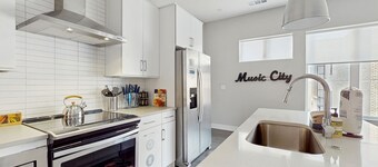 Updated Music City retreat with open kitchen, great location, W/D, & central AC