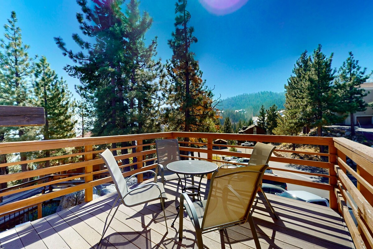 Dog-friendly nature escape with generous balcony, fireplace, & views, sleeps 6