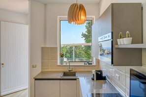Superior Apartment | Private kitchen | Full-size fridge, kitchen islands - PARADISEA TAORMINA (Taormina)