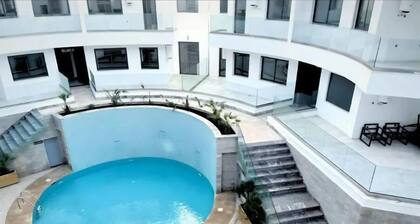 Cosy calm central beach home with swimming pool