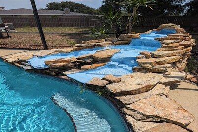 Large 4bd 2bth pool home with waterfall feature and private back yard!