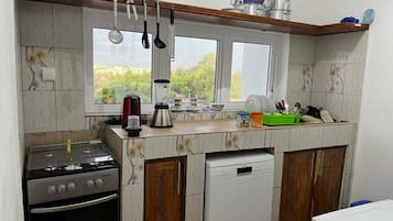 Apartment | Private kitchen | Fridge, microwave, oven, stovetop