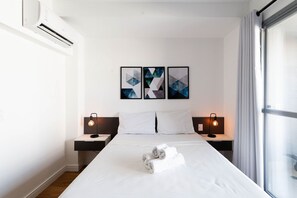 Suite Cyrela 710 | Tabla de planchar con plancha, wifi gratis y ropa de cama