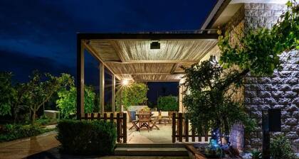 Vacation House "Ulivi nel Mare" typical country home, surrounded by olive trees.