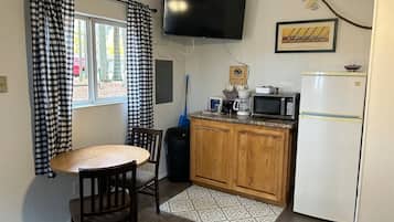 Microwave, coffee/tea maker, toaster, cookware/dishes/utensils