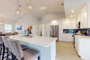 Fridge, microwave, oven, stovetop - Newly remodeled home with heated pool and pool spa, gas grill, & W/D - dogs ok (Cape Coral)