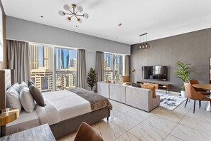 Deluxe Studio | In-room safe, laptop workspace, blackout drapes, iron/ironing board