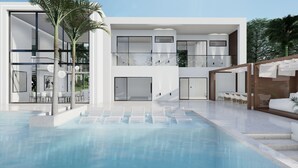 A modern multi-story building with a pool area, outdoor seating, and a covered patio. - AMA VILLAS - Luxury Collection -  **BRAND NEW ****35% DISCOUNT AVAILABLE (Rose Hall)