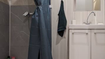 Shower, hair dryer, soap, shampoo