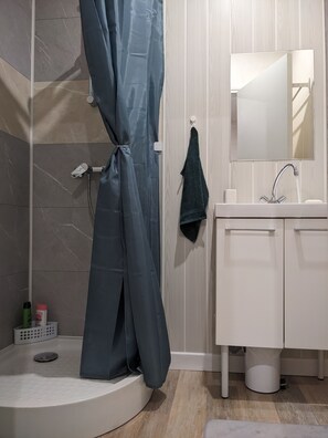 Shower, hair dryer, soap, shampoo