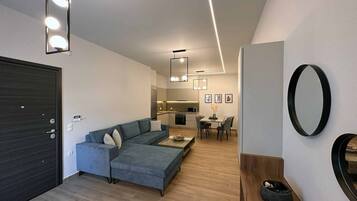 Appartamento Comfort, al piano terra (Armonia) | Area soggiorno | Smart TV 43 pollici con canali digitali
