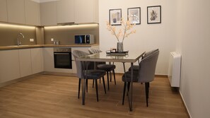 Comfort Apartment, Ground Floor (Armonia) | Living area | 43-inch Smart TV with digital channels - Elia luxury residence (Chalcis)