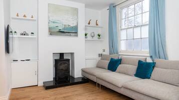 Huis | Woonruimte | Een 55-inch flatscreentelevisie met digitale zenders