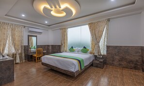 Deluxe Room | In-room safe, desk, iron/ironing board, bed sheets - Treebo Siri Ambari Resorts (Piriyapatna)