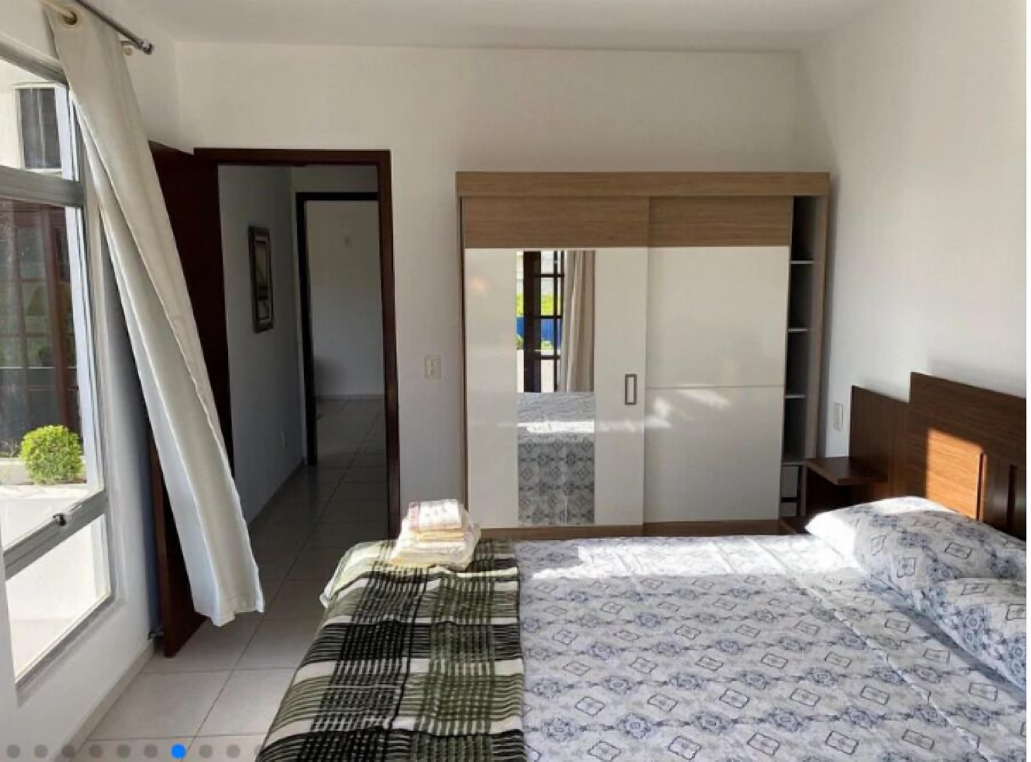 2 bedrooms, desk, blackout curtains, iron/ironing board