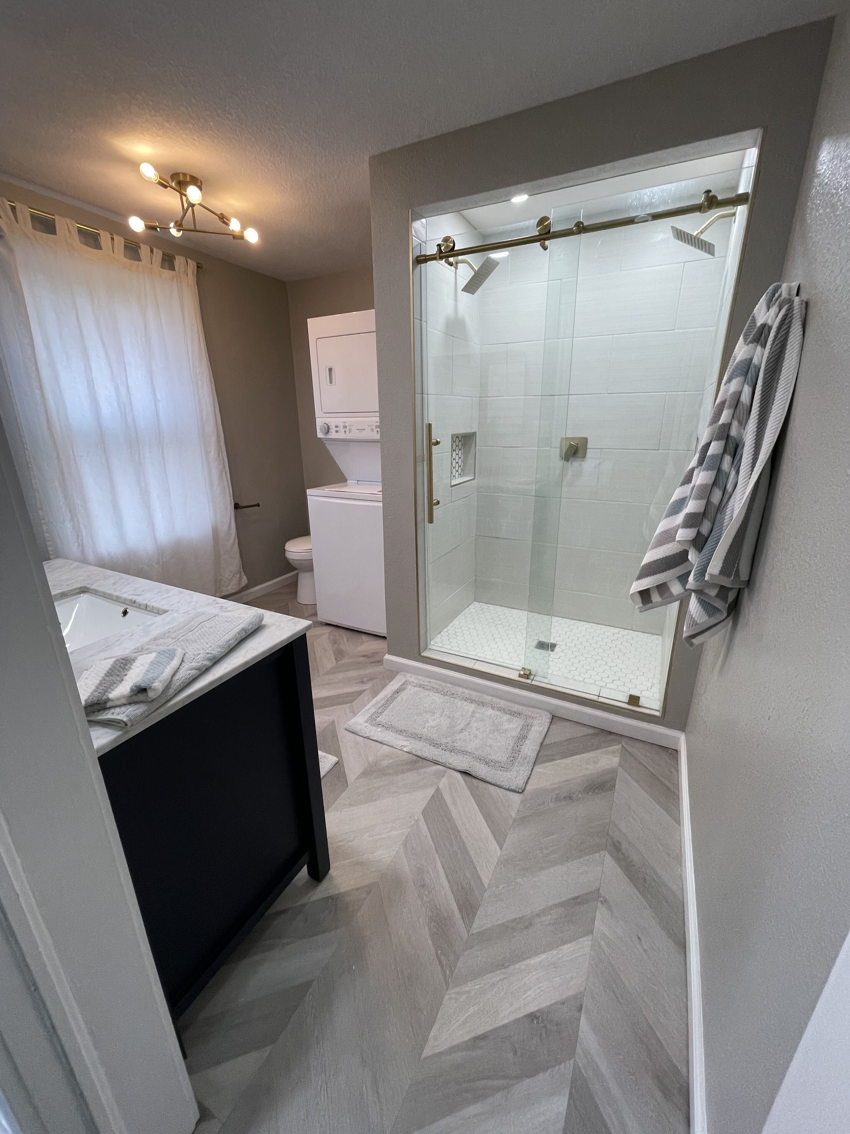 Shower, towels, soap, shampoo