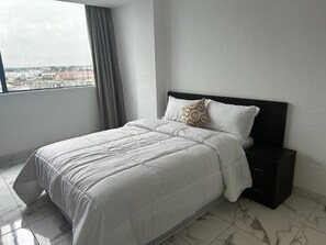 Family Double Room, City View | Desk, soundproofing, iron/ironing board, free WiFi - Apex Suite (Accra)