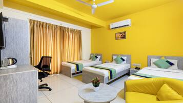 Deluxe Room | In-room safe, desk, iron/ironing board, bed sheets