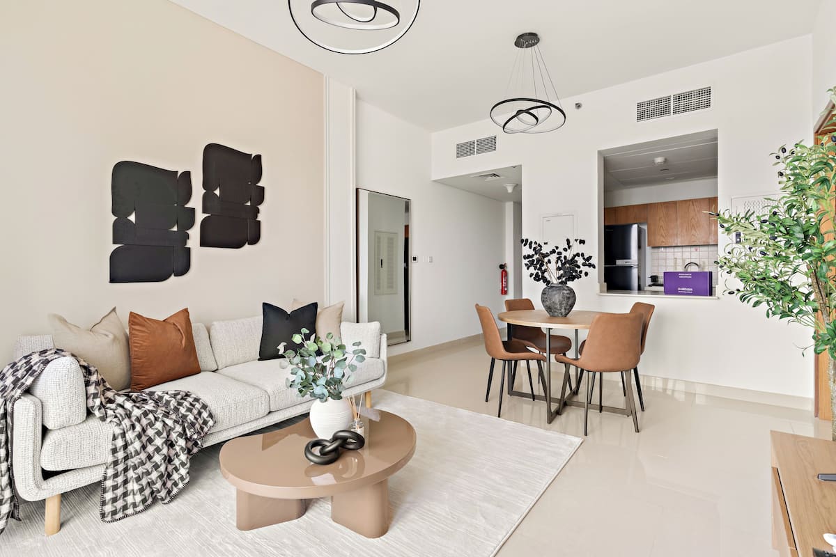 Grand Apartment | Living area | 50-inch Smart TV with digital channels